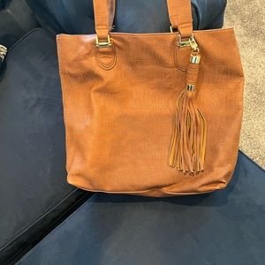 Large leather bag by Steve Madden. copper color in great used condition.